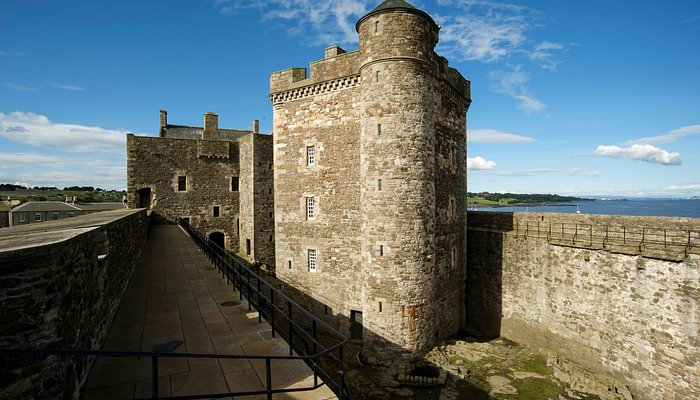Exterior view of Blackness Castle with round tower and walkway